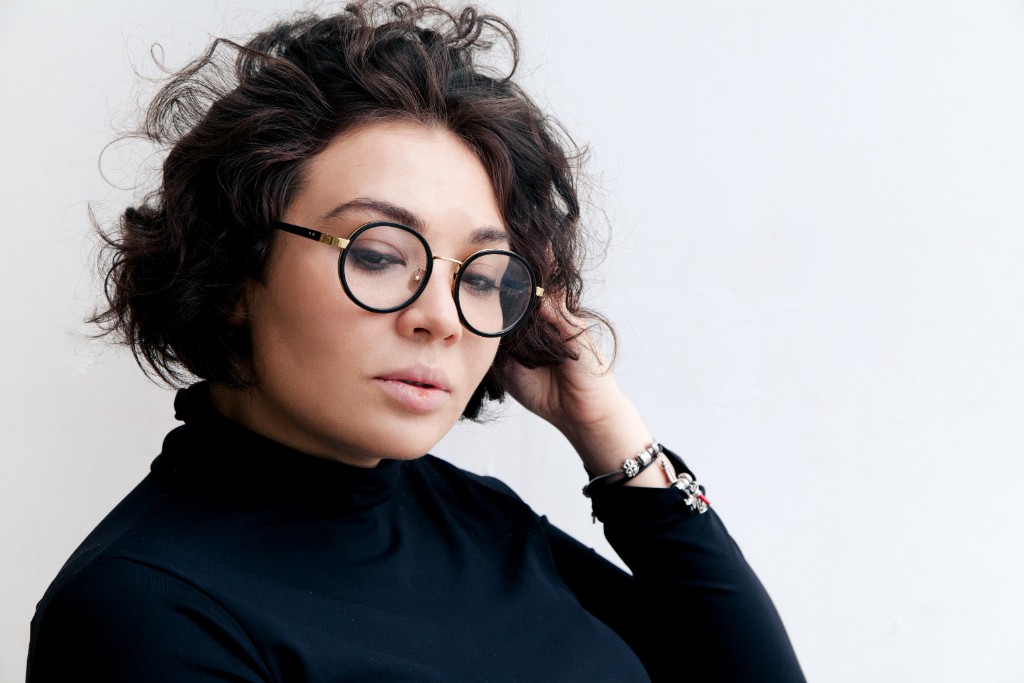 Girl Poses Wearing Eye Glasses