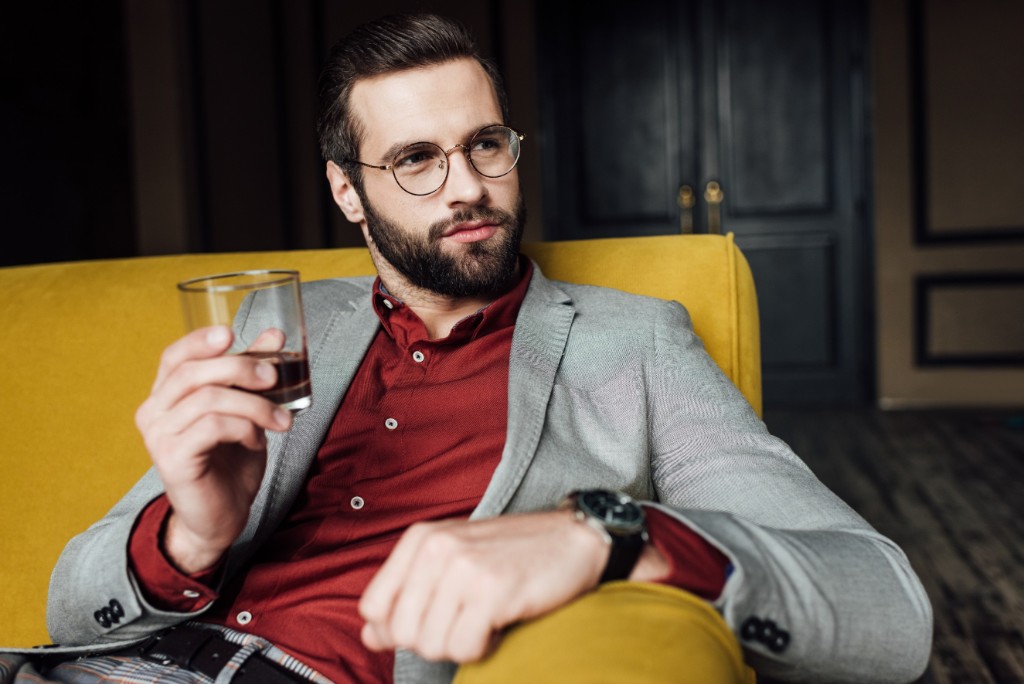 Man Wearing Glasses Drinks Beverage