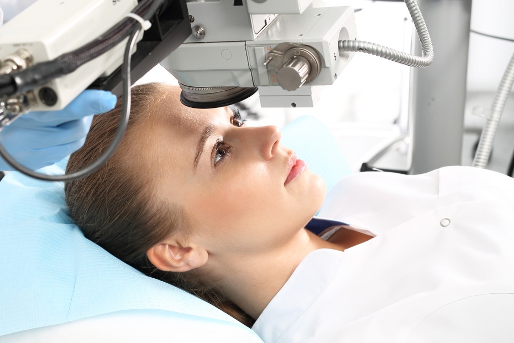 Doctor Inspecting Eye Of A Patient