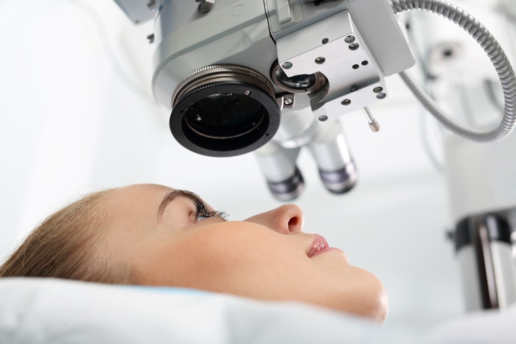 Doctor Inspecting Eye Of A Patient