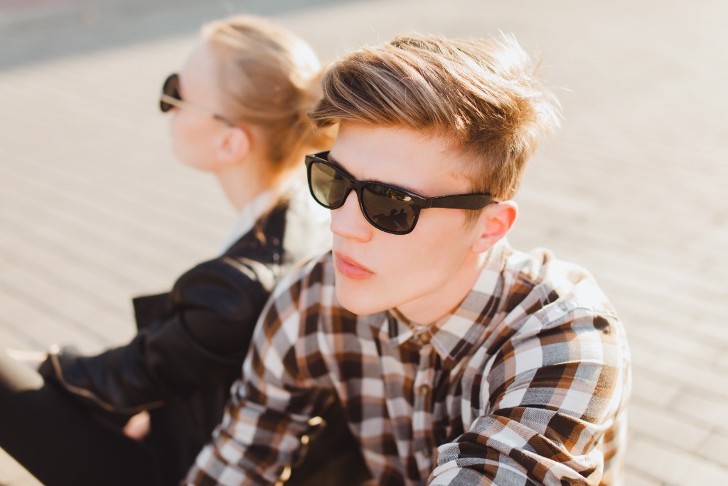 Couple Poses Wearing Black Glasses
