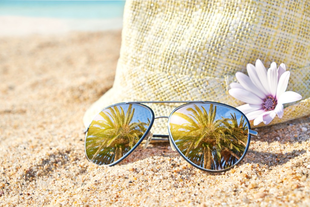 Black Sun Glasses On The Beach